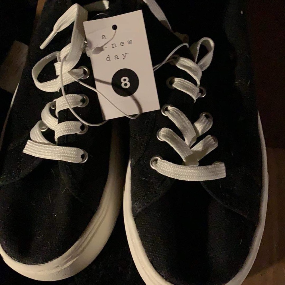 Brand new black sneakers! Never worn tags in place
